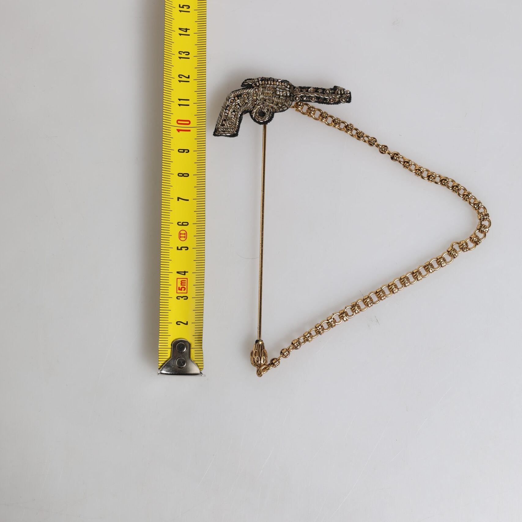 Dolce & Gabbana Black Gold Brass Copper Revolver Brooch Lapel Pin