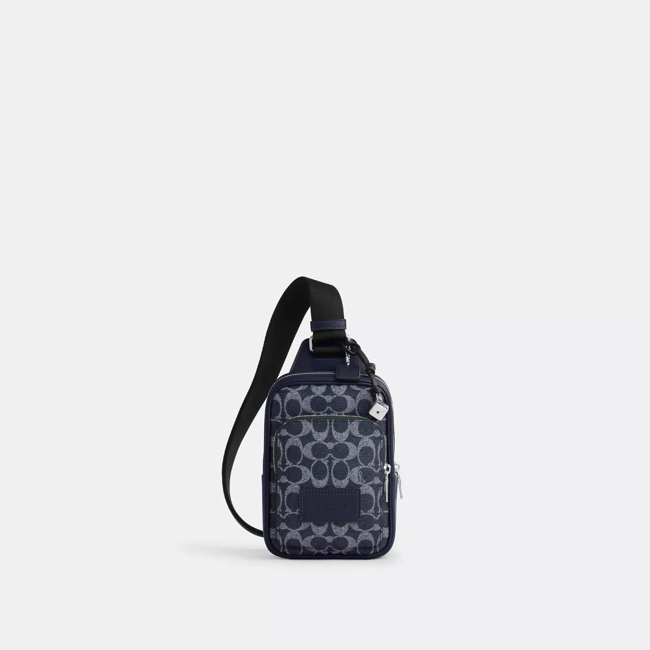 Coach Racer Sling Pack In Signature Canvas With Charms