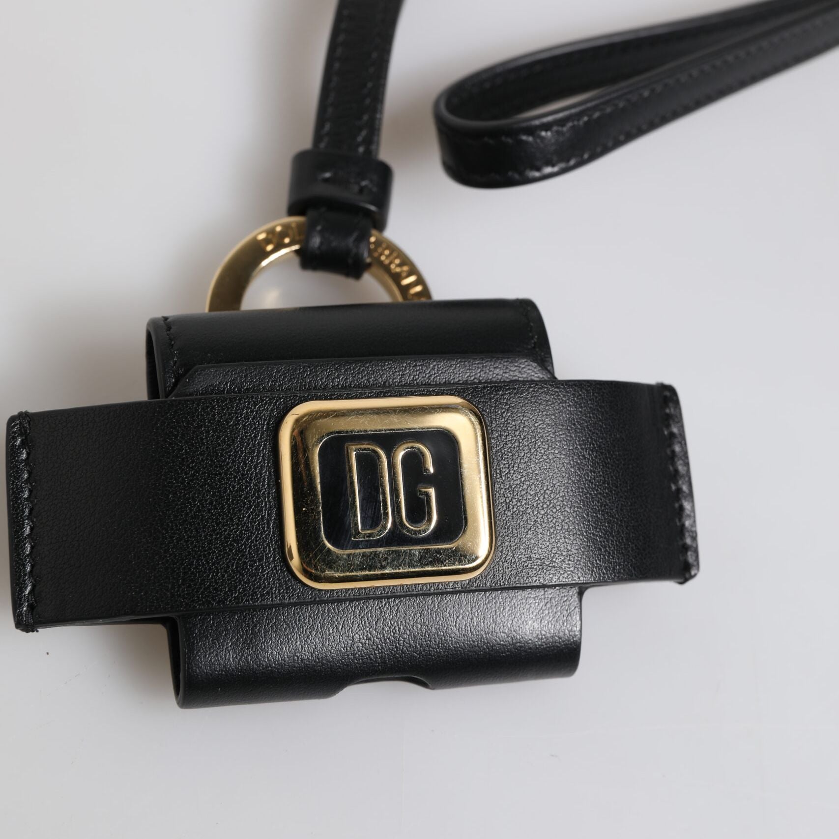 Dolce & Gabbana Black Leather Strap Gold Metal Logo Plaque Airpods Case