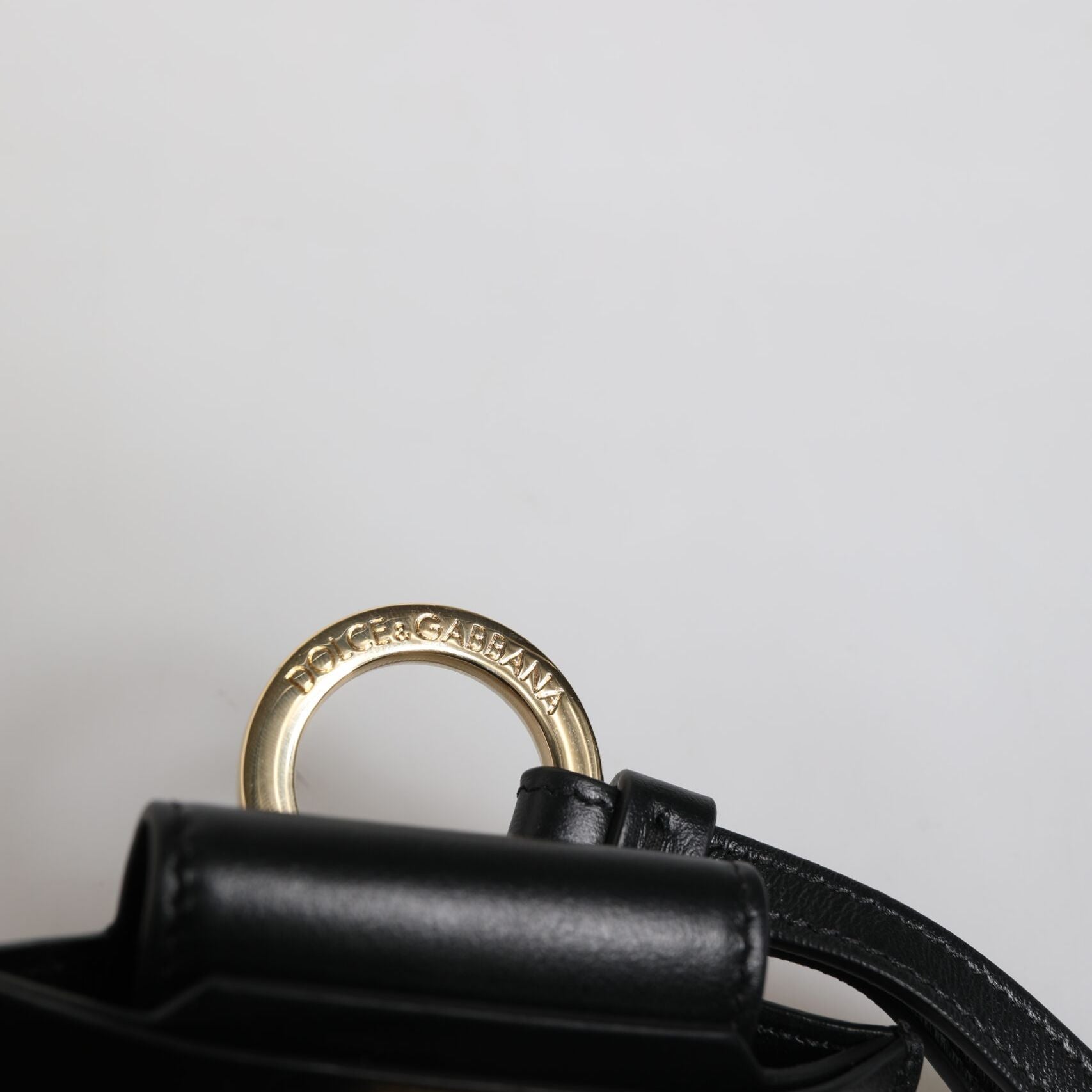 Dolce & Gabbana Black Leather Strap Gold Metal Logo Plaque Airpods Case
