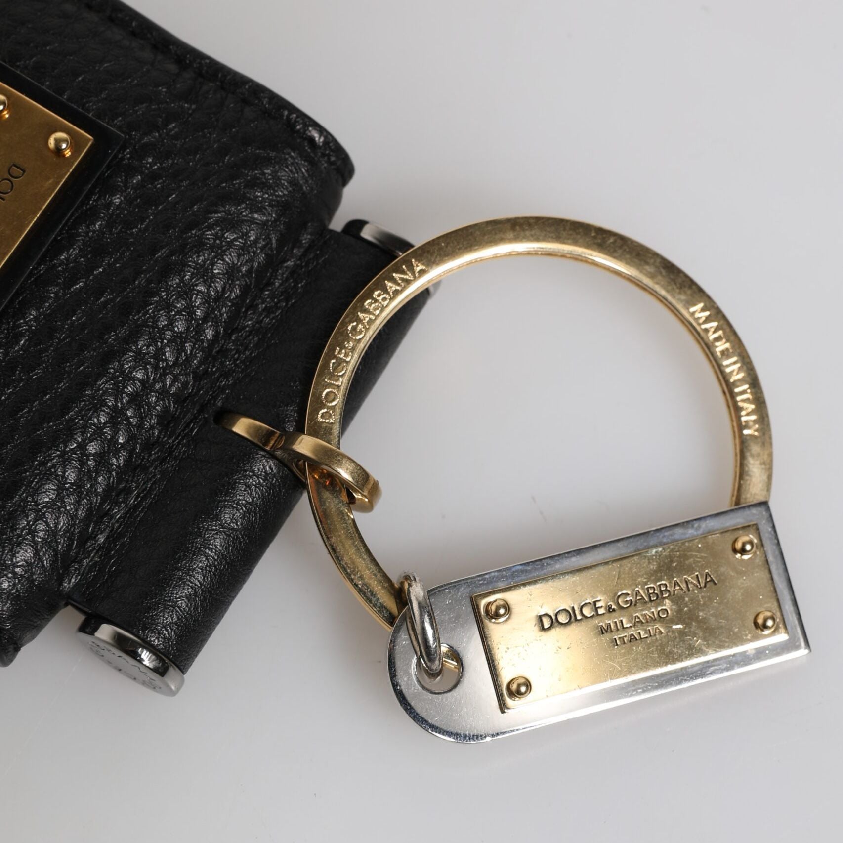 Dolce & Gabbana Black Leather Strap Gold Metal Logo Plaque Airpods Case