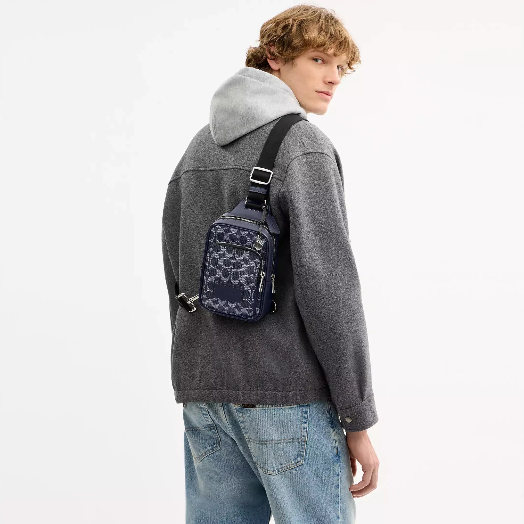 Coach Racer Sling Pack In Signature Canvas With Charms